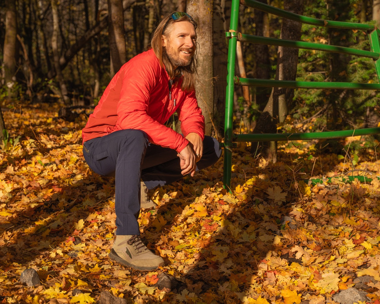 man wearing nebu mens pants squatting