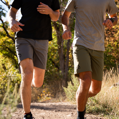 2 men running in Mojito Shorts